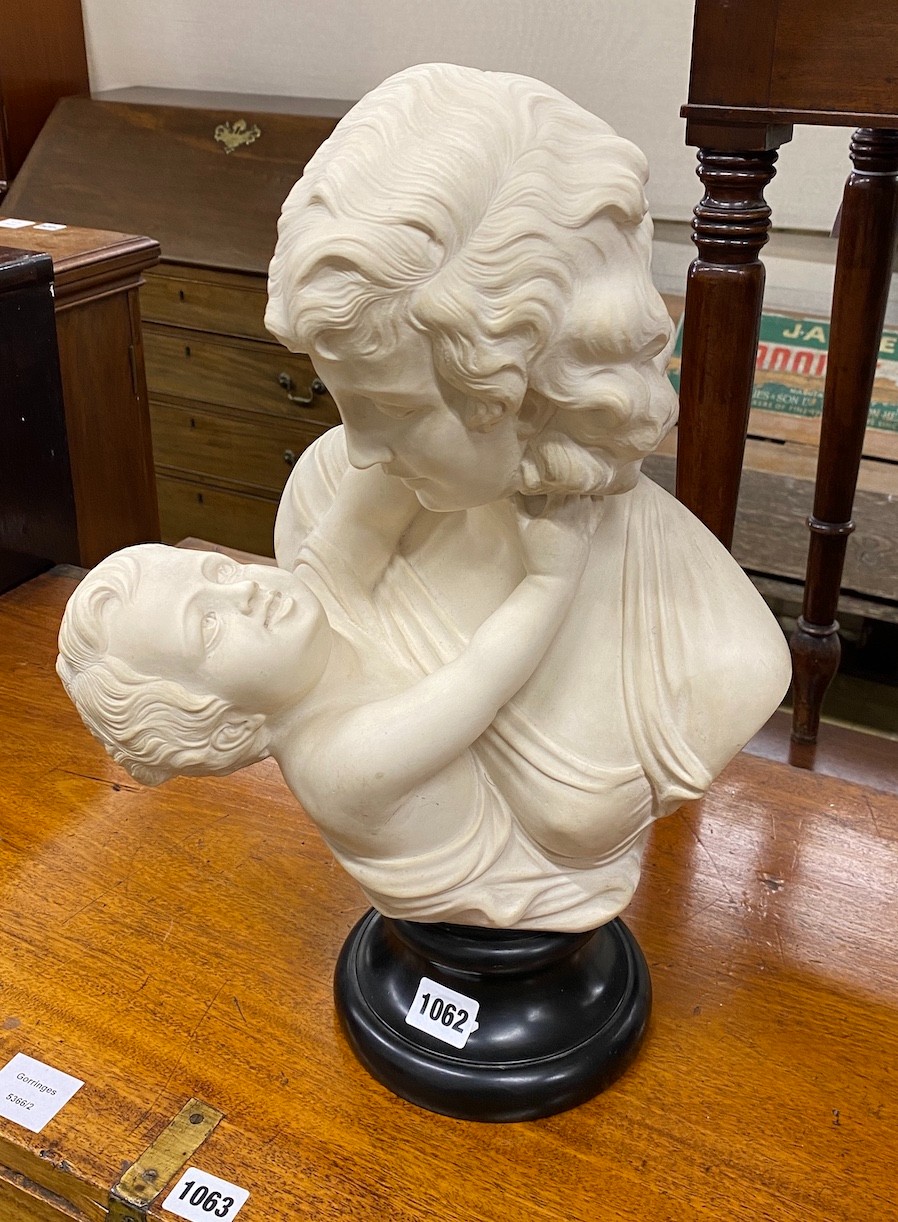 A white simulated marble bust of a mother and child, height 45cm